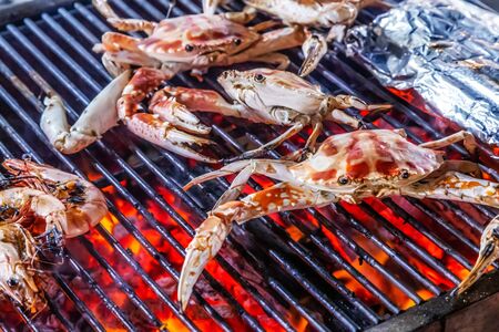 Crab. Cooking Barbecue Fire Grill Close-up blue crabs.の写真素材