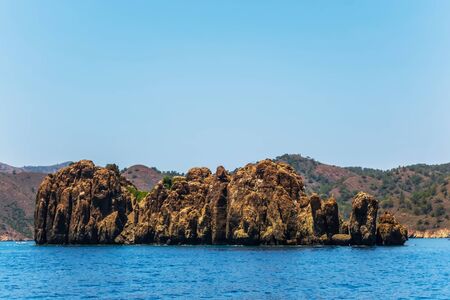 Summer Landscape amazing bay coastal scenic rocks Sharp Teeth. The volcanic island with hills, vacation background concept.の写真素材