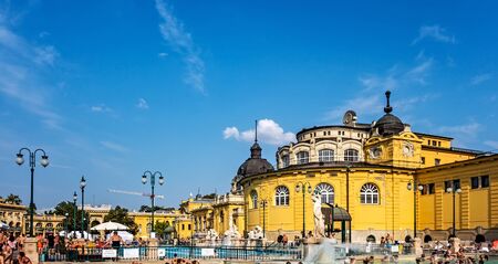 BUDAPEST, HUNGARY. August 24, 2019. Szechenyi Spa outdoor Baths, Budapest. Palace-like edifice contains a huge thermal pool where people. Thermal bath complex in Hungary and in Europeのeditorial素材
