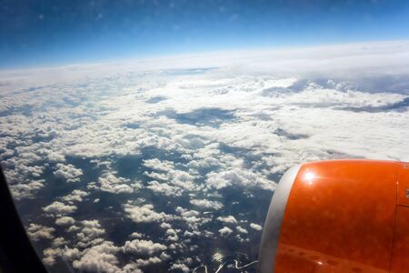 jet turbine airplane flying above clouds travel. Fly cruise transportation concept view from...