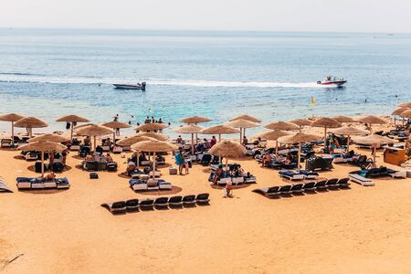 Chairs umbrellas Sinai mountains red sea Egyptの写真素材