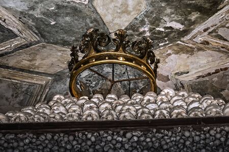 Golden Crown on the Background texture made real human skeleton Pile skull and bone concept...