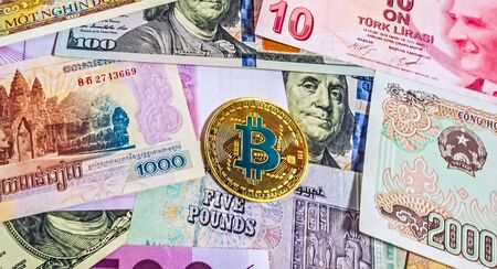 Gold Bitcoin Close up Collection of banknotes. Blockchain technology luxury backround Crypto currency money exchange for trade. Physical Coin Cryptocurrency BTC money Crypto Investing.の写真素材