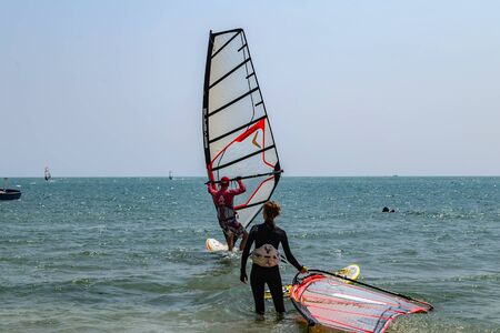 Mui Ne, Phan Thiet, Vietnam - Feb 16, 2015: Windsurfer Surfing The Wind On Wavesl Water Sports. Education school surf in Mui Ne Coco Beach the people Phan Thiet Cam Ranh Bay. Vietnam.のeditorial素材