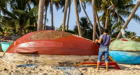 PHAN THIET, MUI NE, VIETNAM - Feb 16, 2015: Fishing Vietnamese boats at the sand beach Mui Ne in fishing village Phan Thiet, Travel Southeast Asia Coast Binh Thuan of Vietnam.のeditorial素材