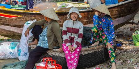 PHAN THIET, MUI NE, VIETNAM - Feb 16, 2015: Fisherman catch boats Vietnamese. People working at fishing pier in fishing village Phan Thiet, Travel Southeast Asia Coast Binh Thuan of Vietnam.のeditorial素材