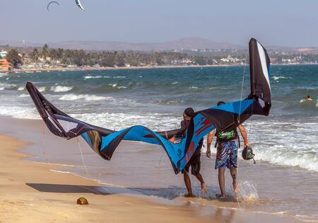 Mui Ne, Phan Thiet, Vietnam - Feb 16, 2015: Kitesurfing - water sport. Kitesurfing Lessons at Kite Centre active people training Mui Ne Coco Beach, Phan Thiet Cam Ranh Bay Vietnam.のeditorial素材