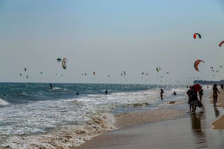 Mui Ne, Phan Thiet, Vietnam - Feb 16, 2015: Kitesurfing - water sport. Kite surf active people training Mui Ne Coco Beach, Phan Thiet Cam Ranh Bay Vietnam. Education school surf.のeditorial素材