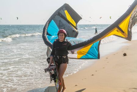 Mui Ne, Phan Thiet, Vietnam - Feb 16, 2015: Kitesurfing - water sport. Kite surf active people...