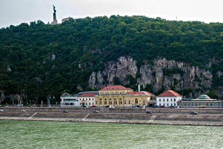 Rudas Baths Ottoman architecture Turkish bath. Liberty satue in the background on the top of the Gellert hill. BUDAPEST, HUNGARY. August 23, 2019.のeditorial素材