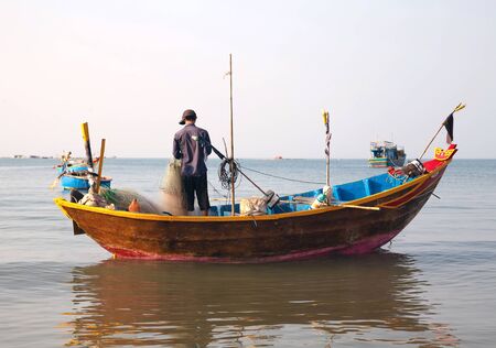 PHAN THIET, MUI NE, VIETNAM - Feb 16, 2015: Fishing Vietnamese boats at the sand beach Mui Ne in fishing village Phan Thiet, Travel Southeast Asia Coast Binh Thuan of Vietnam.のeditorial素材