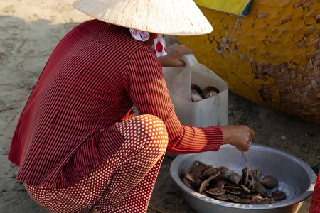 PHAN THIET, VIETNAM - Feb 16, 2015: People fisherman catch working at Vietnamese PHAN THIET harbour...