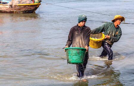 PHAN THIET, VIETNAM - Feb 16, 2015: People fisherman catch working at Vietnamese PHAN THIET harbour...