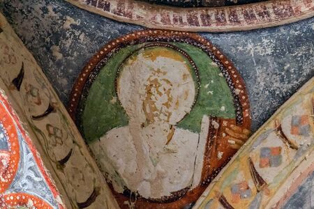 Goreme, Cappadocia, Turkey - May 07, 2014: Fresco Christian Decoration on Ceiling background in cave...