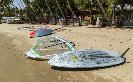Mui Ne, Phan Thiet, Vietnam - Feb 16, 2015: Windsurfers with colored sails Water Sports in Mui Ne Coco Beach the people Phan Thiet Cam Ranh Bay. Vietnam. Education school surf.のeditorial素材