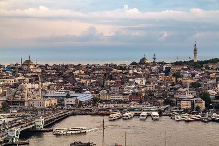 Istanbul, Turkey - May 01, 2014: Panorama sunset aerial cityscape Istanbul architecture. Galata Bridge in Golden Horn Sea. Historic center of City Istanbul Turkey.のeditorial素材