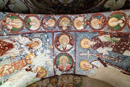 Goreme, Cappadocia, Turkey - May 07, 2014: Fresco Christian Decoration on Ceiling background in cave...
