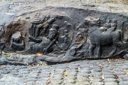 Lingas and sculptures of Hindu gods waterfall at Kbal Spean the valley of a 1000 Lingas in Ankor, Siem Reap, Cambodia Kbal Spean Cambodian riverbed is covered in ancient fertility symbols both waters.の写真素材
