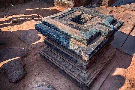Banteay Srei or Banteay Srey temple dedicated to the Hindu god Shiva. Shiva Lingam Stone. Linga-yoni. Yoni square base forms symbol for the divine feminine procreative energy.の写真素材