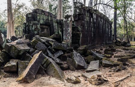 Moss on the stone brick sandstone laterite blocks Prasat Krahom Archaeological Landscape of Koh Ker at the Angkor Wat site in Northwest Cambodiaの写真素材