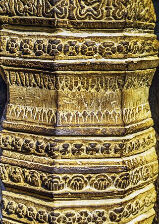 detail of ancient stone bas-relief carvings on the wall background texture - complex Angkor wat...