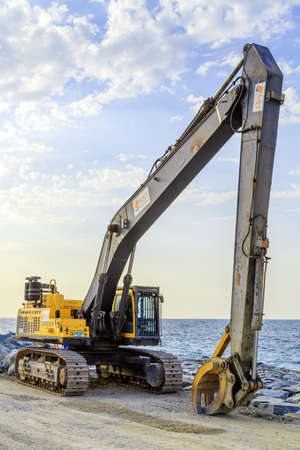 Palm Jumeirah Island, Dubai, United Arab Emirates - JANUARY 26, 2016: Construction Palm Jumeirah is...
