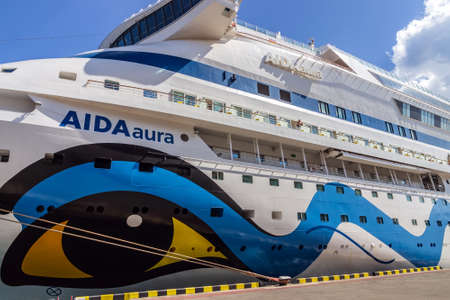 ODESSA, UKRAINE - JULY 22, 2013: AIDAAURA Passenger Luxury cruise ship under flag Italy moored in Marine passenger terminal of the Port of Odessa of Ukraine.のeditorial素材