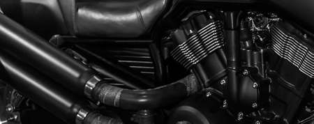Motorcycle Engine with exhaust pipes on a dark background soft focusの写真素材