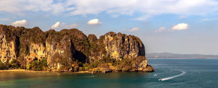 Boats on Railay beach mountain landscape nature. Ao Nang Krabi Phuket Thailand summer vacation tripの写真素材