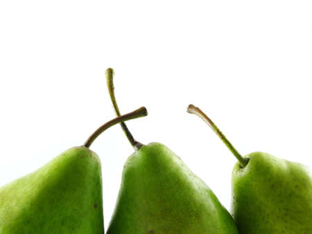 composition on white: three green pearsの写真素材