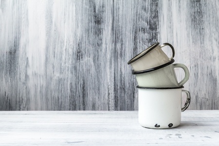 Still life with pyramid of tin cupsの写真素材