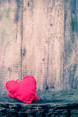 Two hearts on a wooden boardの写真素材