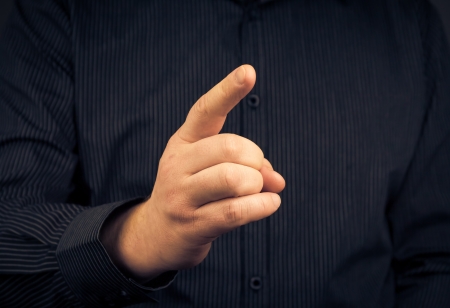 Closeup of a man who threatens his finger