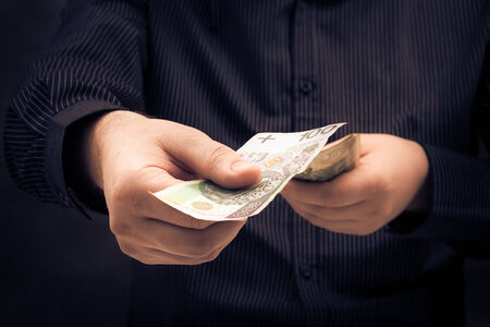 The person counting certain amount of money
