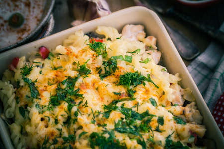 Baked macaroni with chicken and mushroomsの写真素材