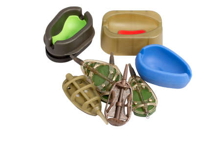 Three Mould and five fishing feeder isolated on a white background
