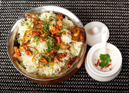 Indian curry meal with balti dish and basmati riceの写真素材