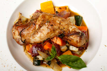 Whole baked juicy chicken with golden crispy skinの写真素材