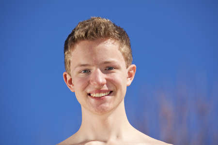 A portrait of a smiling 16 years old teenagerの写真素材