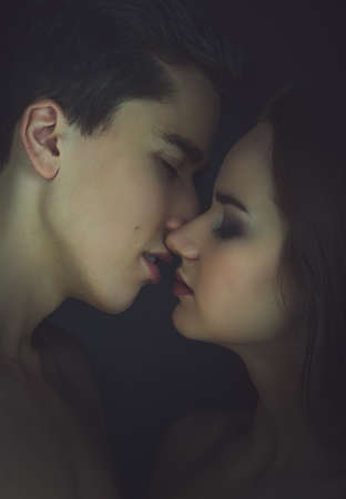 Kissing couple portrait. Instagram toned.の写真素材