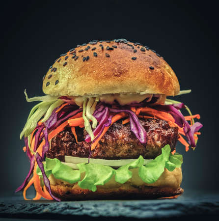 Delicious Homemade hamburger with fresh vegetables. Close-up.の写真素材