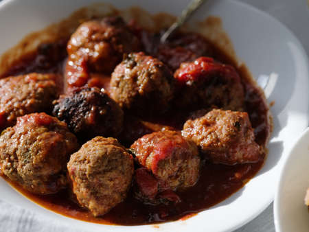 CLoseup of Delicious homemade meat balls in tomato sauceの写真素材