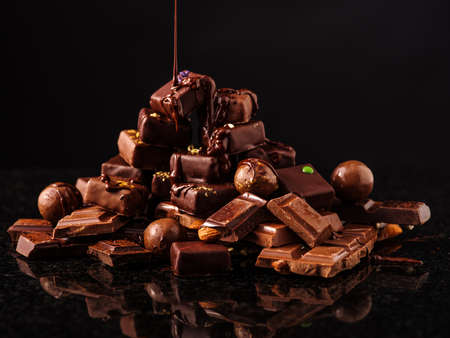 Mountain of chocolate and chocolates candysの写真素材