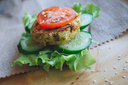 Vegetarian vegan diet Sandwich Burger appetizer with chickpeas lentil cutlet, cucumber, fresh...