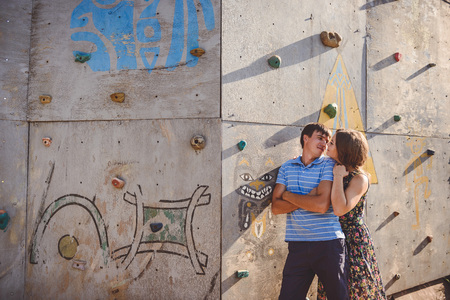 Couple men and women near the climbing wallの写真素材