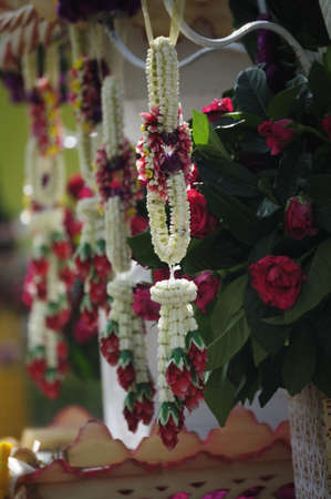 Thai flower garlands for Buddhist religious ceremonyの写真素材