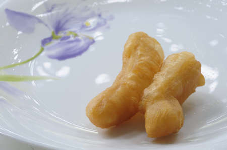 Chinese oil stick or Patongkoh, eaten with sweetened condensed milk, soy milk and coffee 