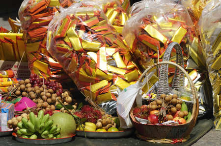 Fruits and ghost money offering to the deadの写真素材