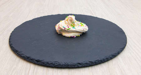 meringues with the ingredients to create them including eggs and sugarの写真素材