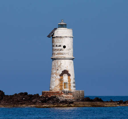 the lighthouse of the boat eater of calasetta, south sardinia, on a beautiful summer dayの写真素材
